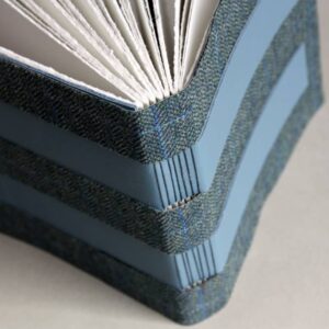 Tweed and leather cross structure journal in blue