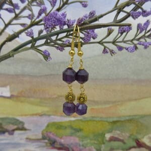Amethyst drop earrings with gold plated flowers by Indigo Berry